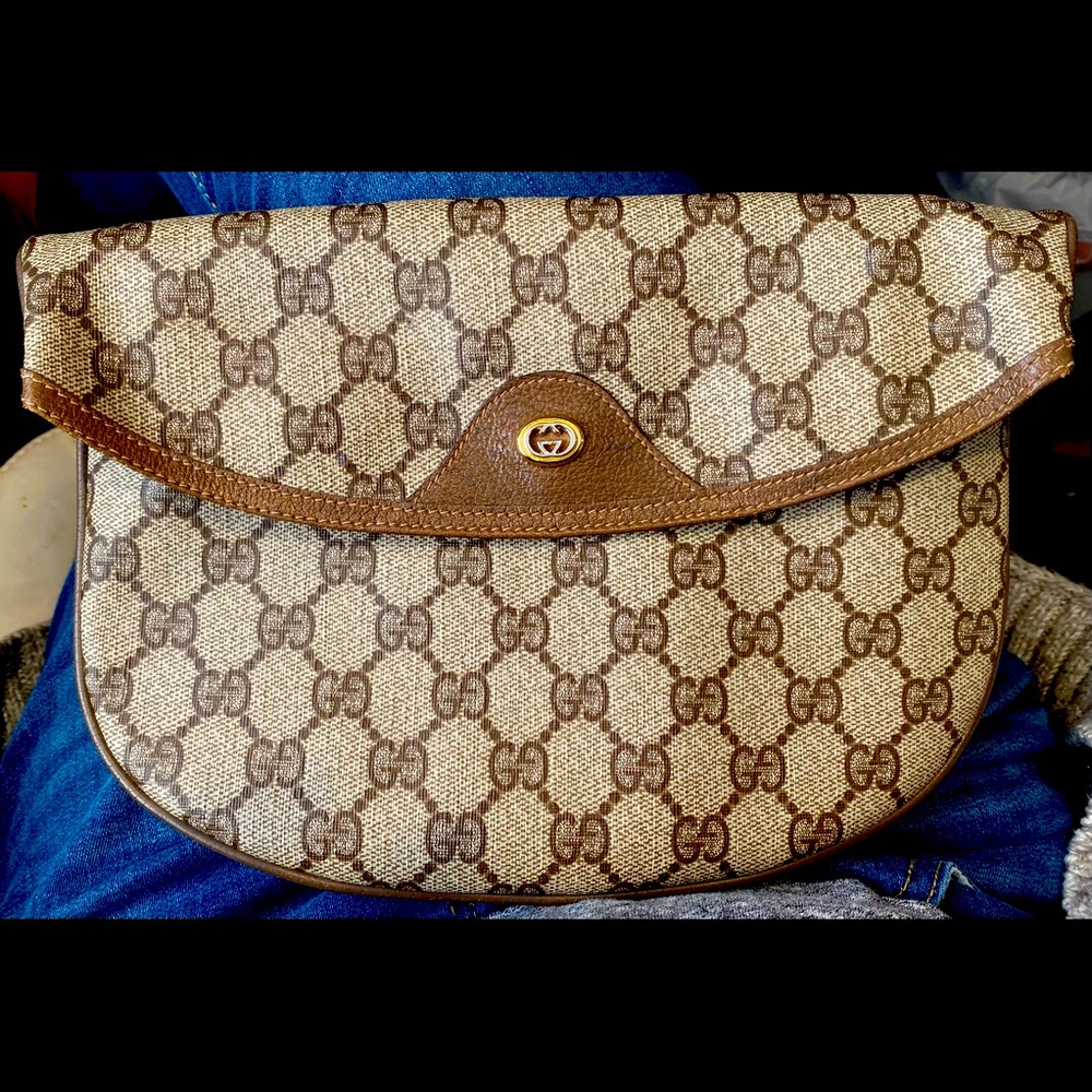 Vintage GUCCI fold over clutch from the accessory collection. 1983